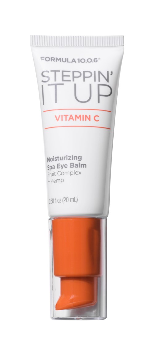 En tube øjenbalm med orange låg, etiketten siger 'Steppin' It Up' Vitamin C, fugtgivende, til ansigtet.