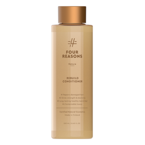 En lång, beige flaska med guldlock, märkt "Four Reasons Rebuild Conditioner," innehåller 250 ml balsam för håret.