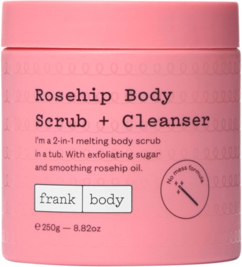 Ein rosa Behälter mit Aufschrift 'Rosehip Body Scrub + Cleanser' und einem kleinen Kreis, der eine saubere Formel anzeigt.
