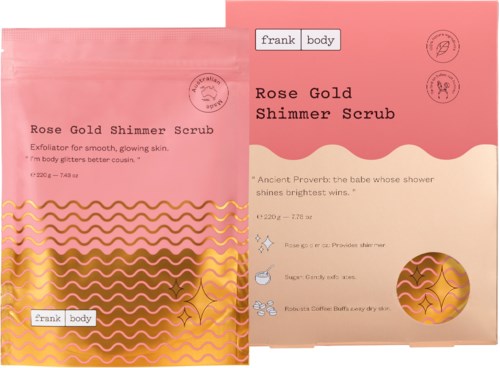 Förpackning för Rose Gold Shimmer Scrub, rosa och guld design med text och vågiga linjer.