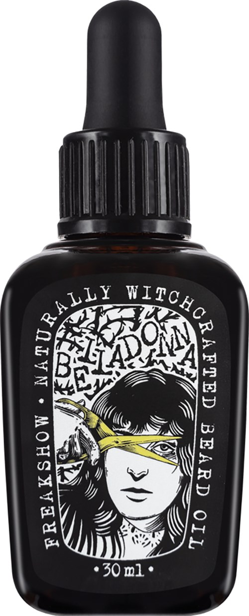 En liten mörk flaska med pipett, märkt 'Breakshow, Naturally Witchcrafted Beard Oil, 30 ml,' med en kvinnas ansikte och en gul ögonbindel.