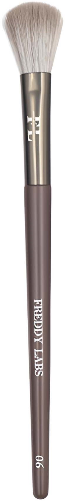 A makeup brush with white bristles and a brown handle, labeled 'Freddy Lias 090.'
