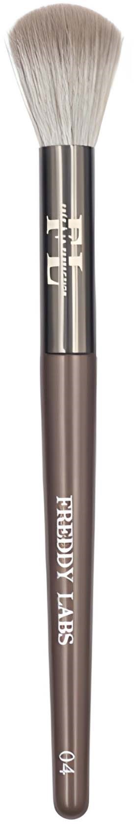 A makeup brush with light-colored bristles and a dark handle labeled "FREEDOM ZAPS" and "e".