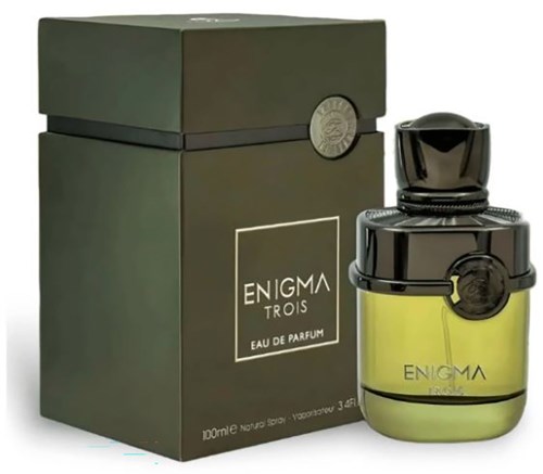Butelka perfum o nazwie Enigma Trois z żółto-zieloną cieczą, obok pasujące ciemnozielone pudełko.