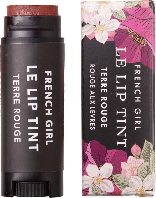 A black stick lip balm and floral patterned box with pink, white, and green flowers, labeled French Girl Le Lip Tint.
