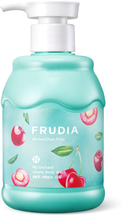 En mintgrön flaska märkt 'FRUDIA' med bilder av körsbär och frukt, innehållande körsbärstvål.