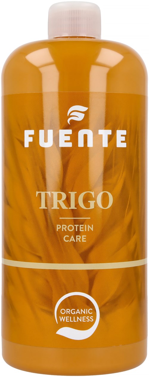En stor orange flaska märkt 'Fuente Trigo Protein Care' med vit lock. Har en wellness-logga längst ner.