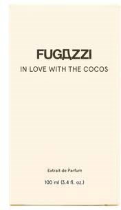 Fugazzi perfume bottle, simple white label with black text, and some small decorative details at the bottom.