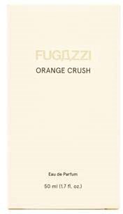 A perfume box labeled 'Fugazzi Orange Crush' with beige background and gold lettering.