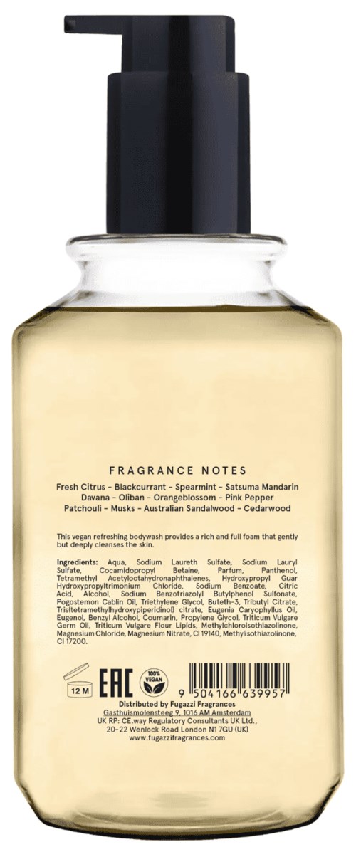 A clear bottle with a pump features fragrance notes like lemon, jasmine, and musk and contains a light yellow liquid.