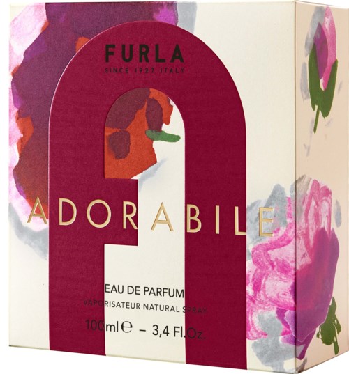 Pudełko z perfumami Furla Adorable z kwiatowym i różowym wzorem, duża czerwona litera 'A' i informacje o perfumach.