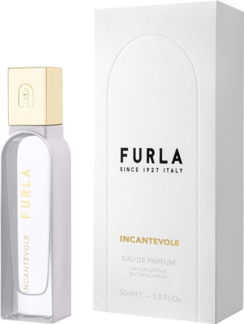 Butelka perfum obok białego pudełka z czarnym i złotym tekstem, które wskazuje na Furla Incantevole Eau de Parfum.