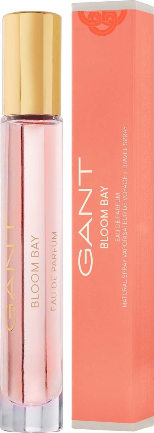 A pink perfume bottle with a gold cap and matching box, labeled GAIANT BLOOM BAY.