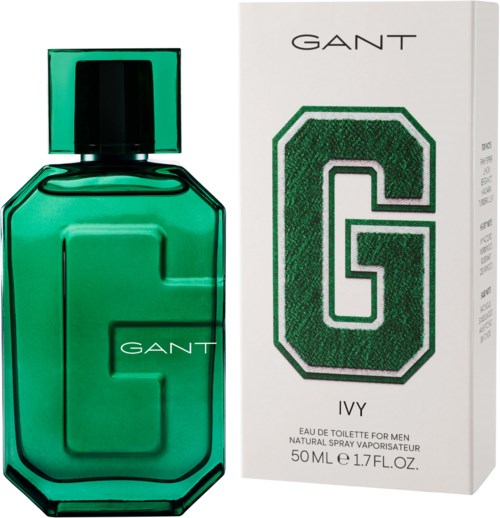 A green perfume bottle with a black cap and a white box with a big letter G and 'GANT' written above.