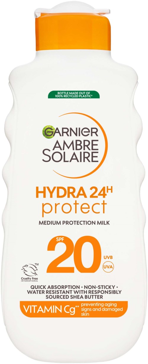 Sonnenschutzflasche mit SPF 20, orange Kappe, und weißer Körper. Enthält Vitamin C, schützt die Haut, und ist wasserfest.