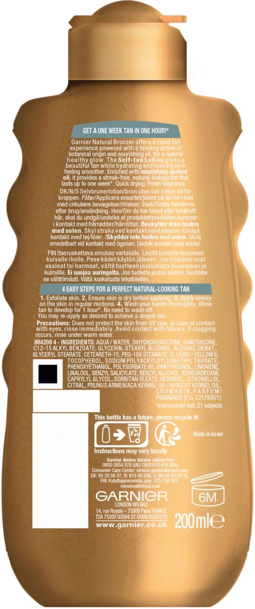 Een goudgele fles shampoo met gedetailleerde tekst en labels, inclusief streepjescode, logo en instructies.