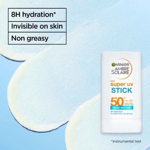 Solkrämstift med 8 timmars fukt, osynlig på huden, icke-fet, med SPF 50 och shea smör. Produkt visas i vit tub.