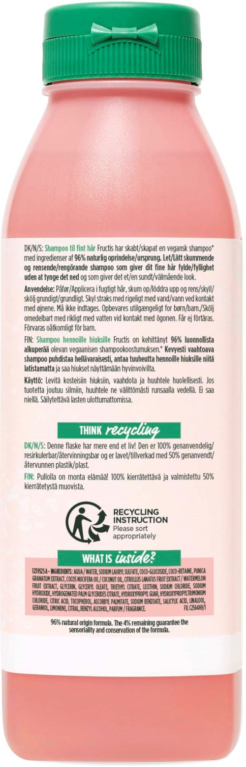 Rosa flaske med grønt lokk, inneholder rengjørings- eller personlig pleieprodukt. Etiketter med instrukser og resirkuleringssymboler.