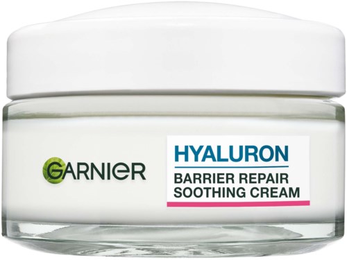 En burk med Garnier Hyaluron Barrier Repair Soothing Cream med vit lock och etikett som visar produktnamnet.