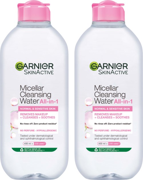 Two bottles of Garnier SkinActive Micellar Cleansing Water All-in-1 for normal and sensitive skin with pink caps.