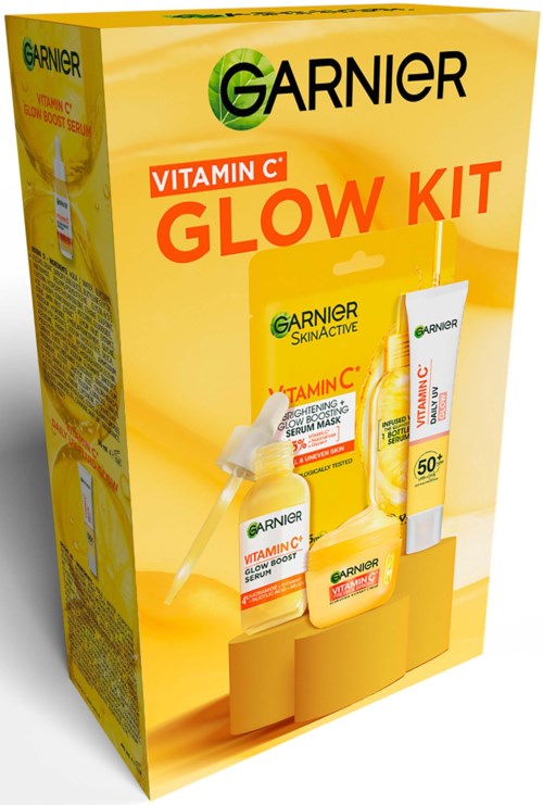 Garnier Vitamin C Glow Kit -paketti, sisältää ihonhoitotuotteita ja kirkkaan keltainen pakkaus.