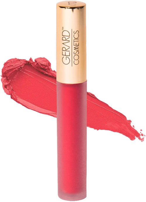 Ett rosa läppglans med guldkapsel, från Gerard Cosmetics, med ett smuts av gloss bakom.