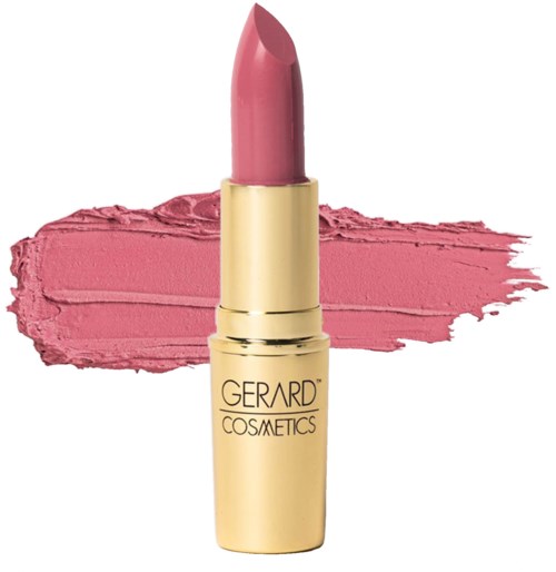 Läppstift i rosa mot en rosa läppstiftspårbakgrund. Gyllen förpackning med märket Gerard Cosmetics.