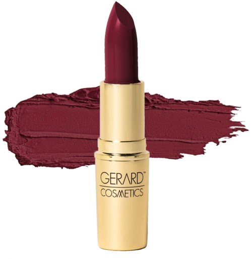 En röd läppstift står upprätt med en rödaktig linje bakom, i ett gult lock märkt Gerard Cosmetics.