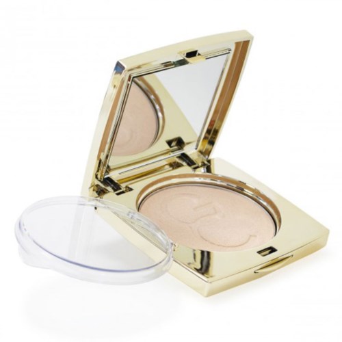 En makeup-kompakt med spegel, innehållande beige puder för ansiktsapplicering.