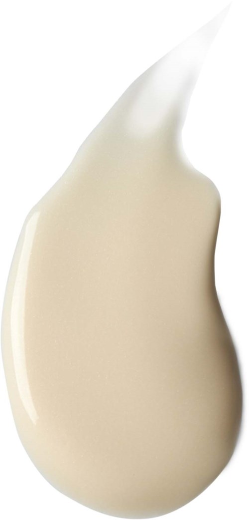 Kropelka białego kremu lub lotion o gładkiej teksturze.