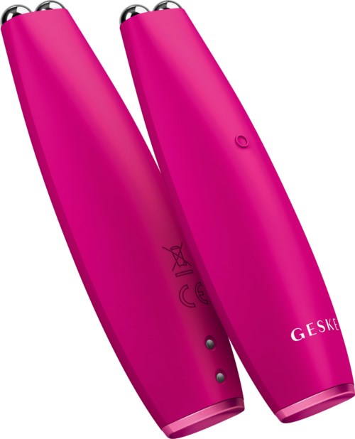 Två rosa handhållna enheter, troligen personvårds- eller groomingverktyg, med knappar och symboler på ytan.