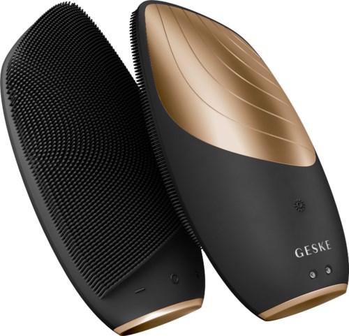 Wireless handheld devices with soft silicone tips, one black and one gold, branded Geske.