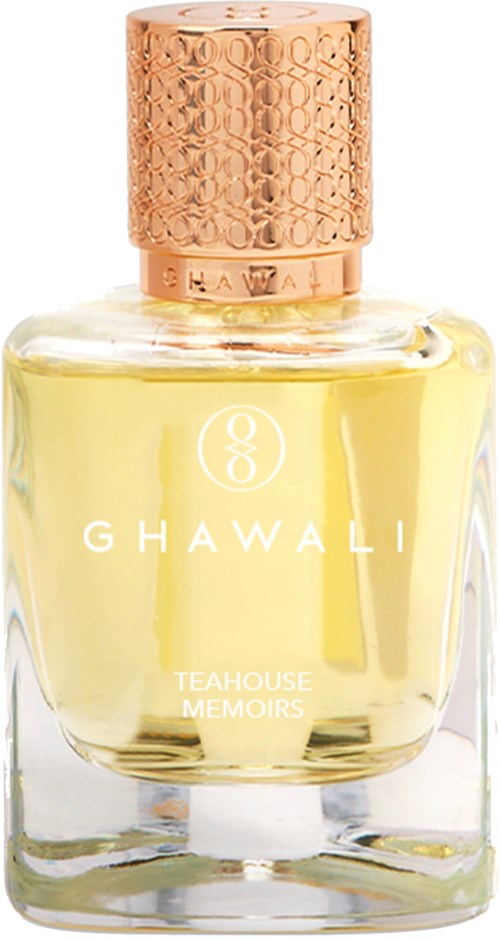 A glass perfume bottle with a golden cap, labeled Ghawali Teahouse Memoirs, containing yellow perfume.