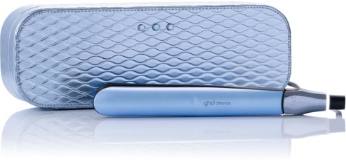 A blue device with a cylindrical shape, placed next to a matching patterned case. It is likely a vaping or e-cigarette device.