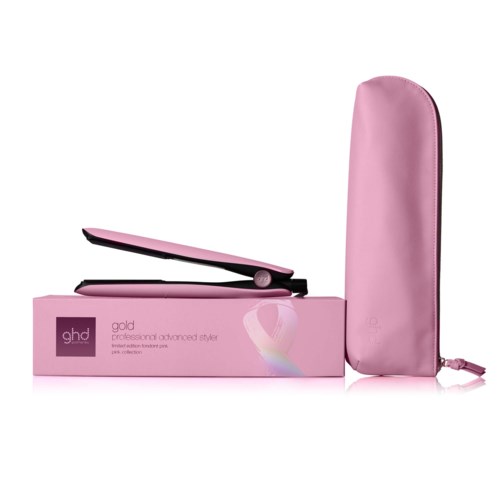 A pink straightening iron with a matching pink case, placed on a pink box labeled 'ghd gold professional advanced styler.'