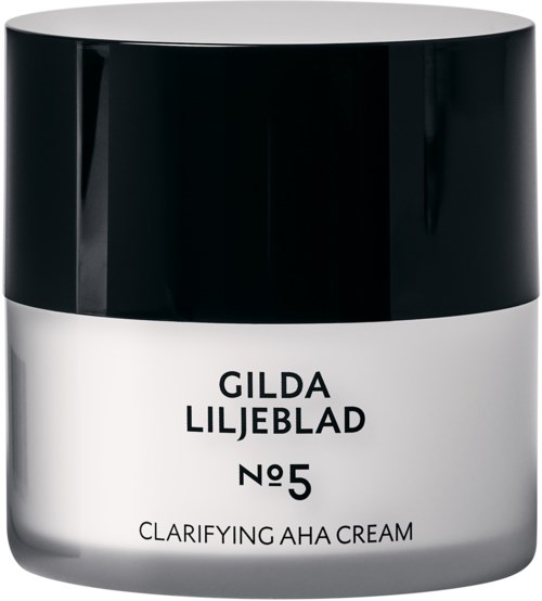 Biały słoik z czarną nakrętką, oznaczony Gilda Liljeblad No5 Clarifying AHA Cream.