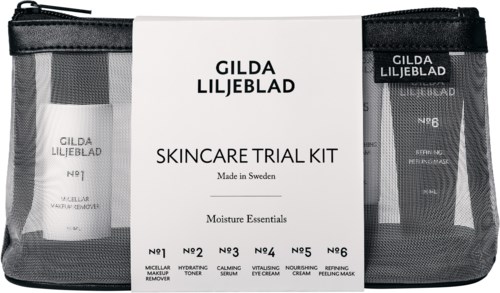 Skincare trial kit in a clear bag with six small tubes and bottles, labeled with different skincare products, from Gilda Liljeblad.