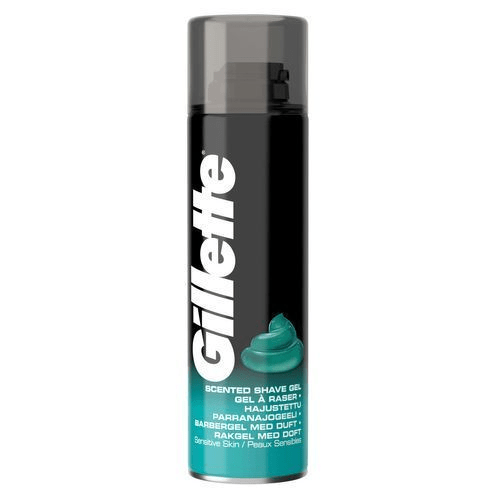 En svart sprayburk med Gillette doftande rakgel, blå färgad gel och vit text.
