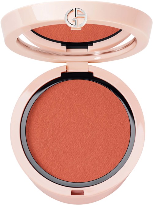 A blush compact with a pink outer case and a mirror inside the lid.