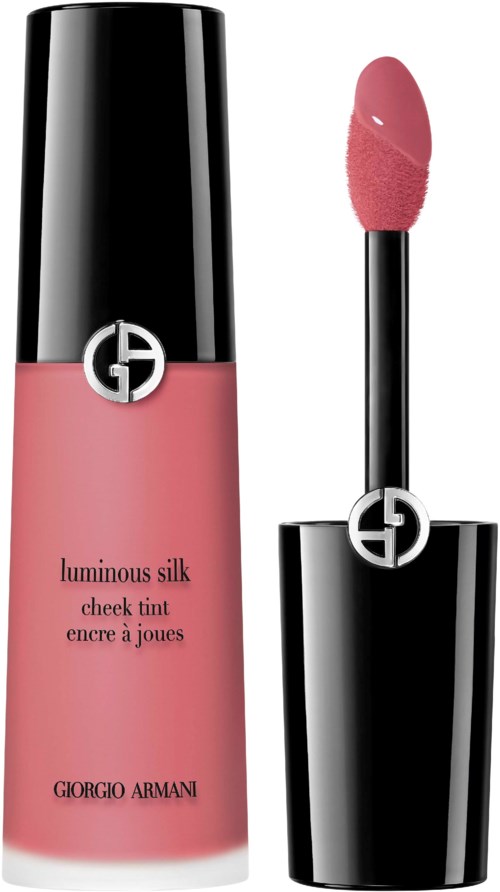 En rosa lipgloss med svart lokk og Giorgio Armani-logo, brukt for lepper, plassert ved siden av applikatoren.