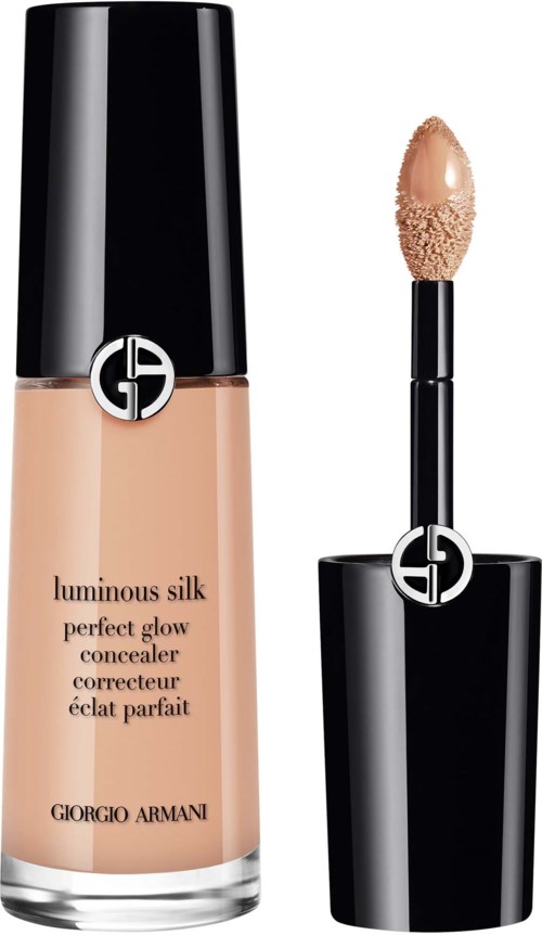 A foundation bottle and a lipstick with black caps and Giorgio Armani logo, both in elegant black and beige colors.