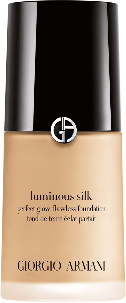 A bottle of Giorgio Armani luminous silk foundation with black cap and beige liquid inside.