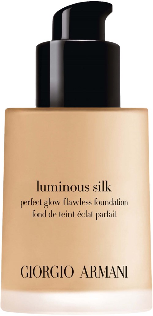 A beige foundation bottle with a black pump, labeled 'Luminous Silk' by Giorgio Armani.