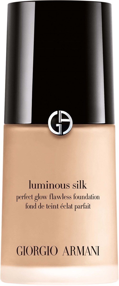 En flaska av Giorgio Armani Luminous Silk foundation, beige färg, med svart lock och logo på.
