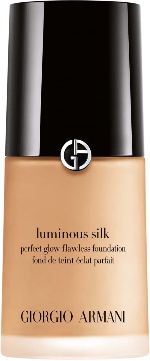 A bottle of Giorgio Armani Luminous Silk foundation with a black cap and beige liquid inside.