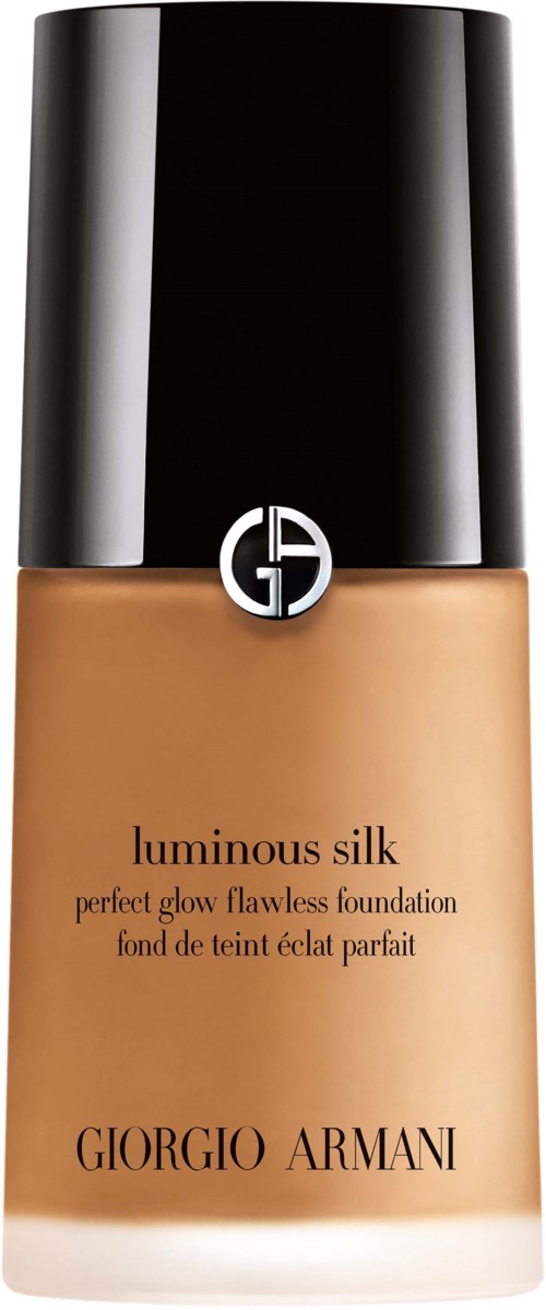 A foundation bottle with black cap and beige liquid inside, labeled 'Luminous Silk' by Giorgio Armani.