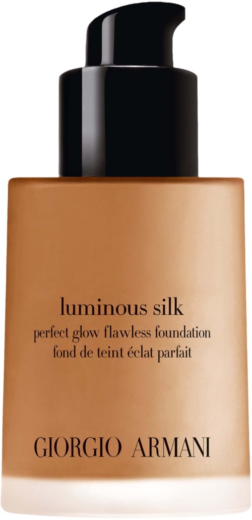 A foundation bottle with a black pump, beige color, labeled 'Luminous Silk' by Giorgio Armani.