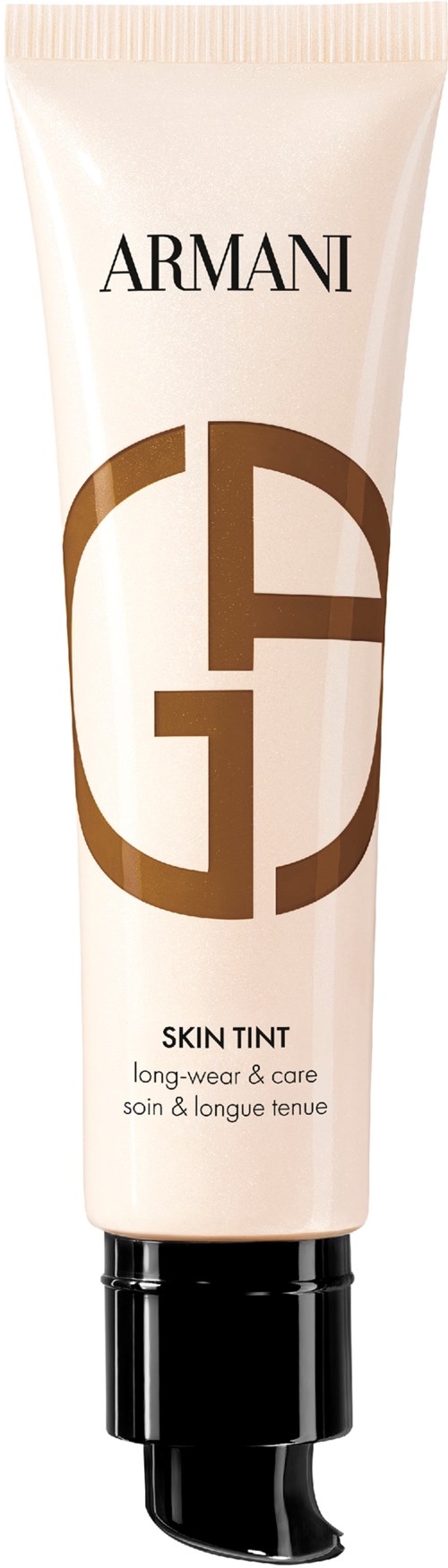 En vit tub av Armani skin tint med svart lock och en stor brun G, logotyp, i mitten.