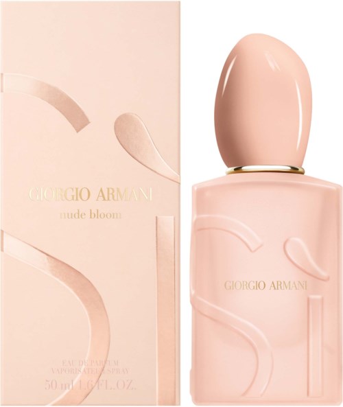 Vaaleanpunainen hajuvesipullo ja sen pakkaus, joissa tyylikäs muotoilu ja Giorgio Armani -teksti.