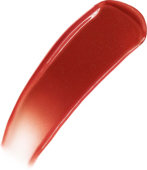 En närbild av ett rött läppstift med blank, slät yta och en lätt rundad spets.